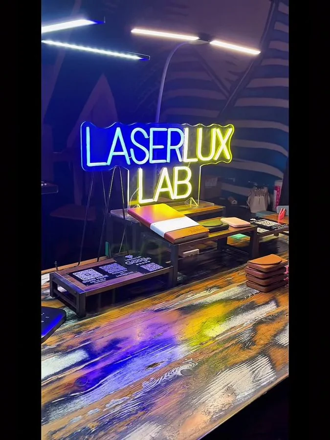 Live laser engraving station at a corporate event in Dallas-Fort Worth